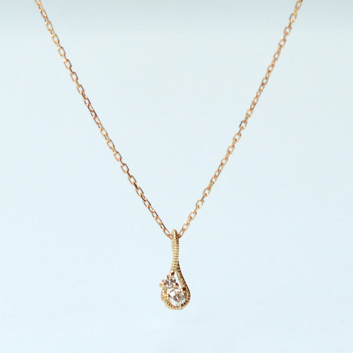 幸せを運ぶもの・ダイヤモンドネックレス・水【K10YG】21W