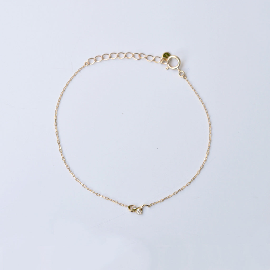 幸せを運ぶもの・ダイヤモンドブレスレット・風【K10YG】