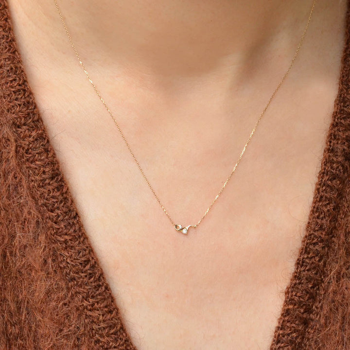 幸せを運ぶもの・ダイヤモンドネックレス・風【K10YG】21W